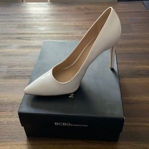 All white BCBG Pumps!